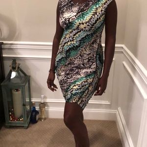 Body hugging multi colored dress.